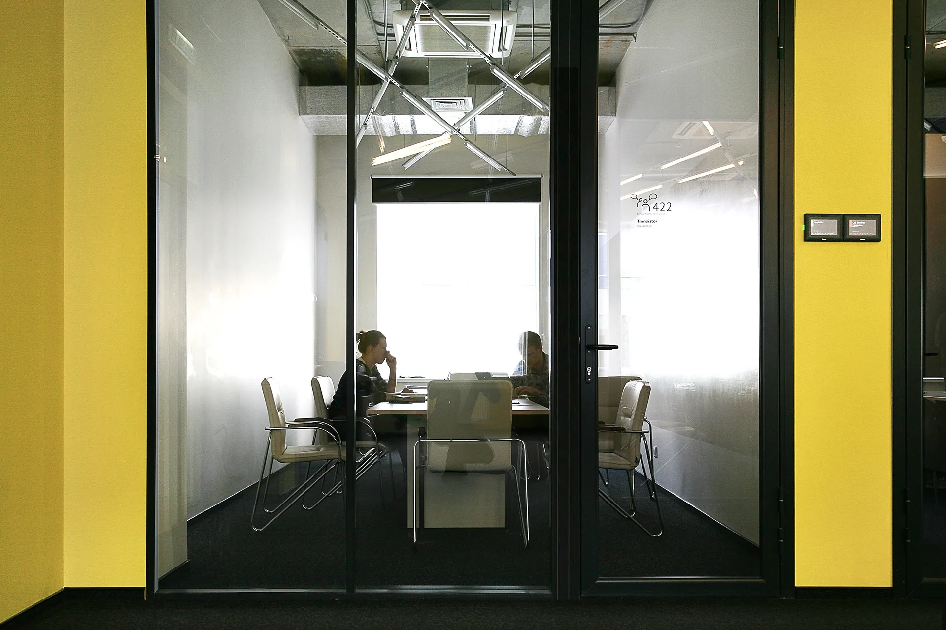 A meeting room beside the yellow corridor