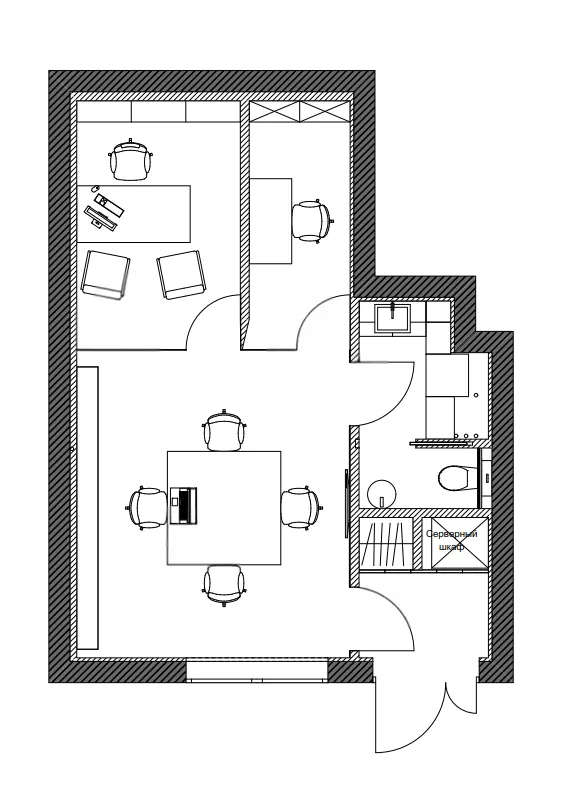 Literator's compact floor plan, with the shared table and enclosed rooms